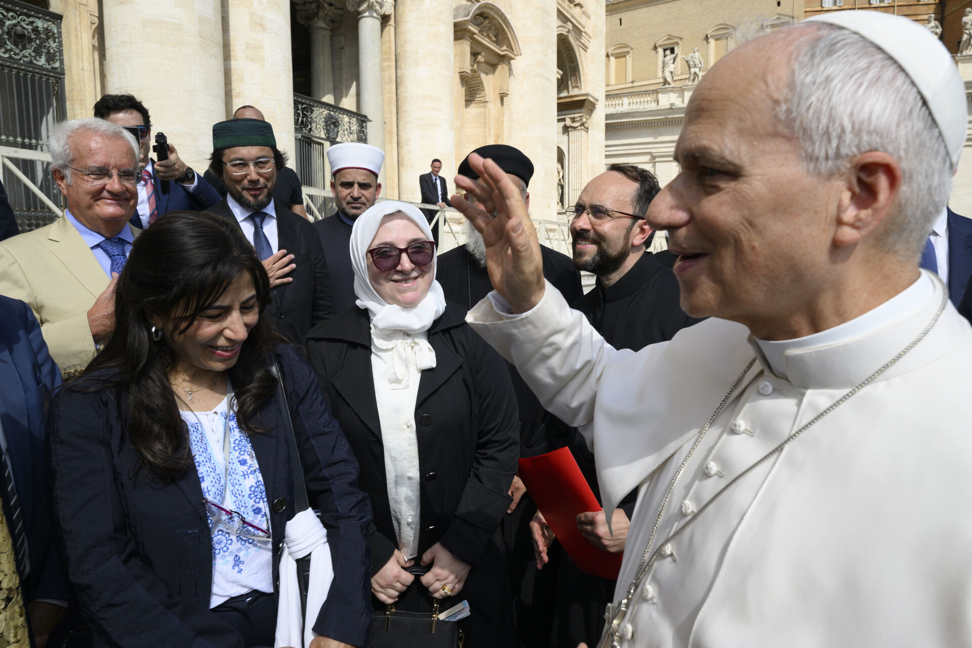 Pope Leo XIV greets the IPDC delegation in St Peter's Square